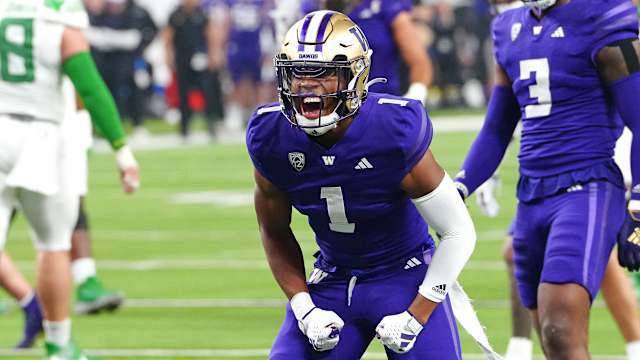 Dec 1, 2023; Las Vegas, NV, USA; Washington Huskies cornerback Jabbar Muhammad (1) celebrates after making a play against the Oregon Ducks during the second quarter at Allegiant Stadium. Mandatory Credit: Stephen R. Sylvanie-USA TODAY Sports